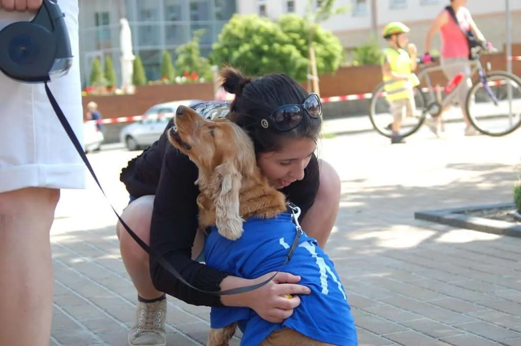 Pic 9 a woman hugging a dog