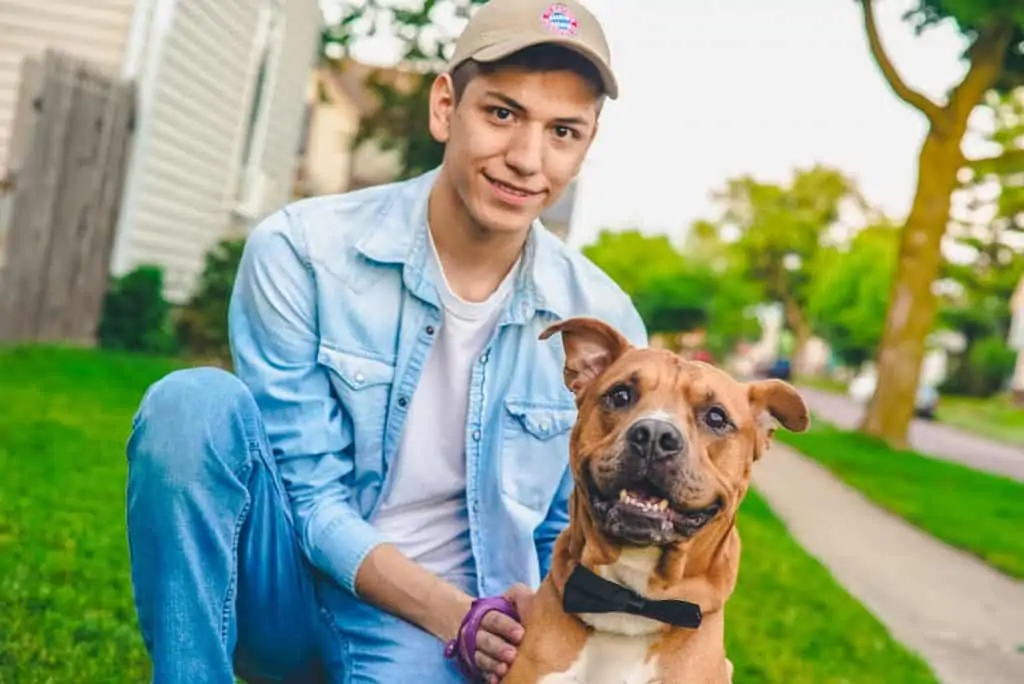 10 a man with a boxerbull mix